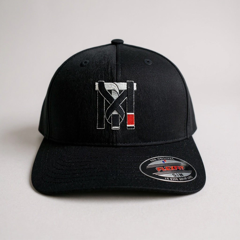Black Top Mount Jiu Jitsu Flex Fit Hat with embroidered TM logo, BJJ belt detail, and official Flexfit brim sticker.
