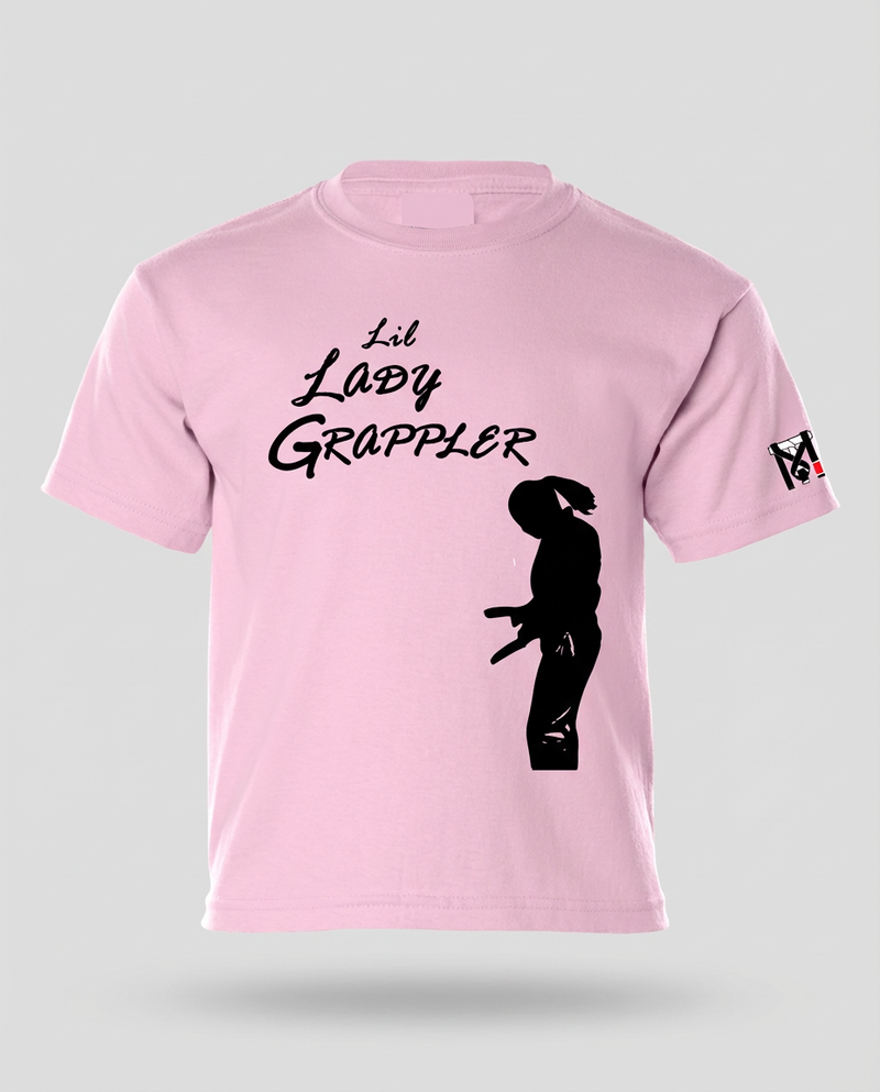 Pink Lil Lady Grappler Youth Girls Jiu Jitsu T-Shirt featuring a black silhouette and Top Mount sleeve logo.