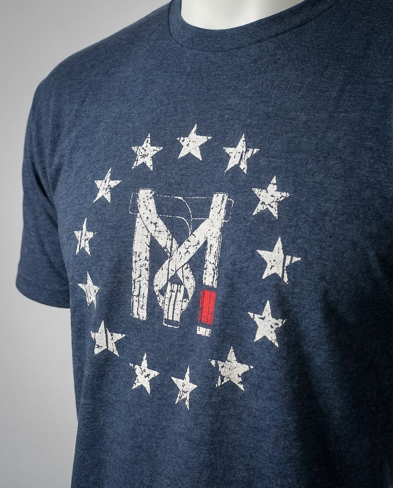 Blue heather BJJ t-shirt with distressed jiu-jitsu belt graphic and white stars on a mannequin.