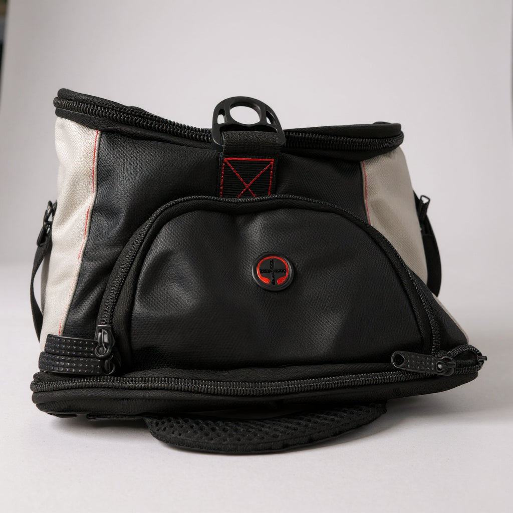 Top Mount BJJ gym bag in black and white with red stitching, featuring a TM logo and heavy-duty zipper pockets.