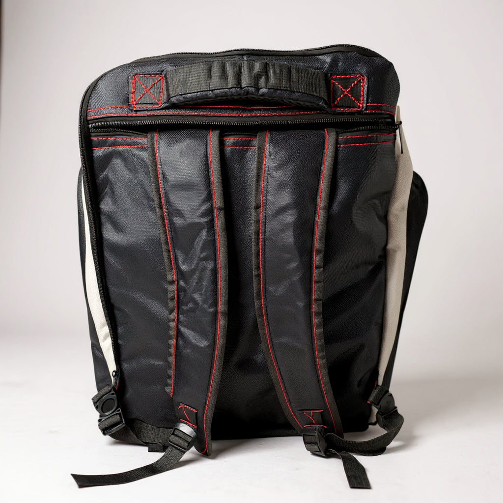 Back view of Top Mount BJJ Gym Bag featuring reinforced hybrid backpack straps and signature red stitching.